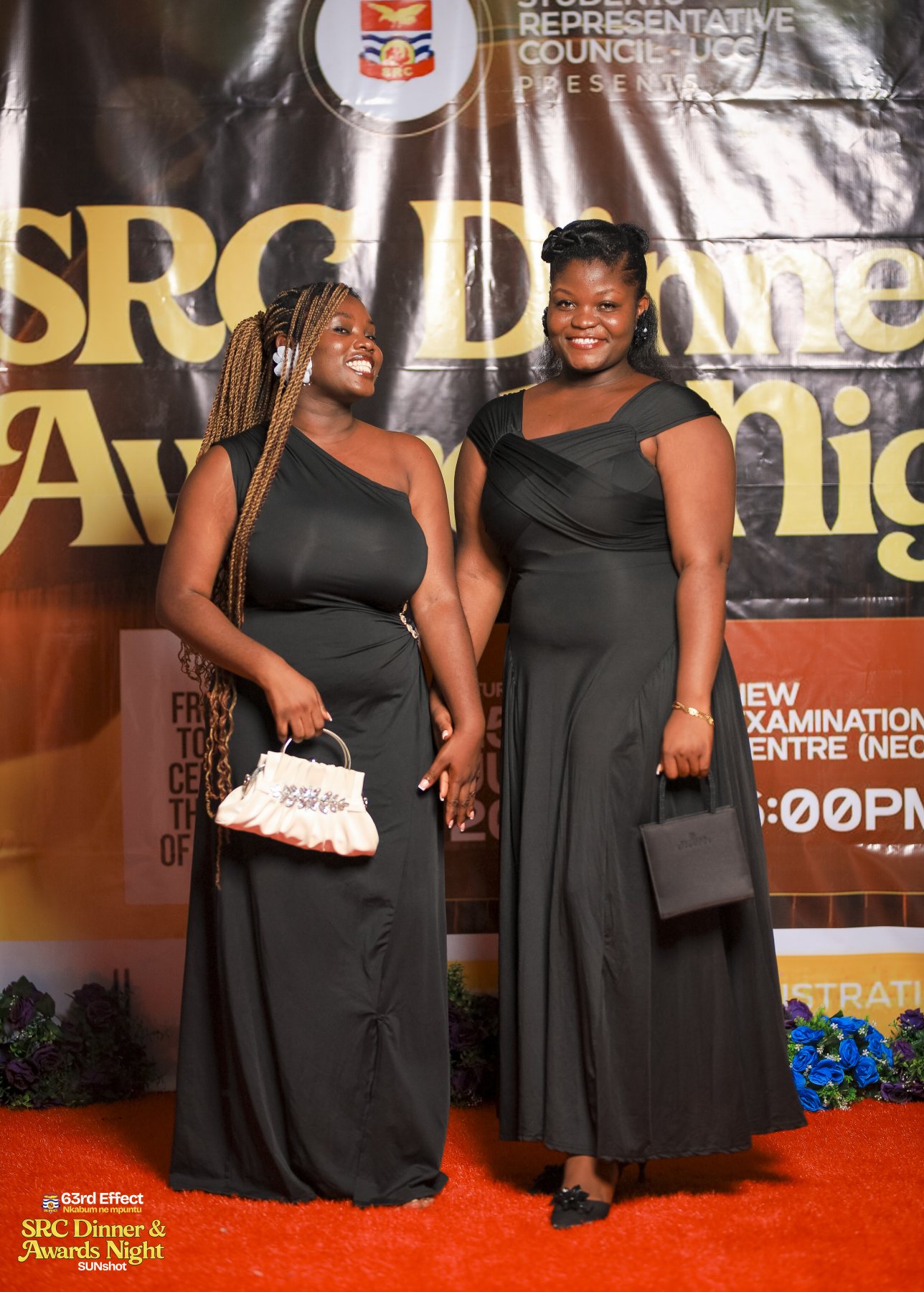 Guests posing with evening accessories