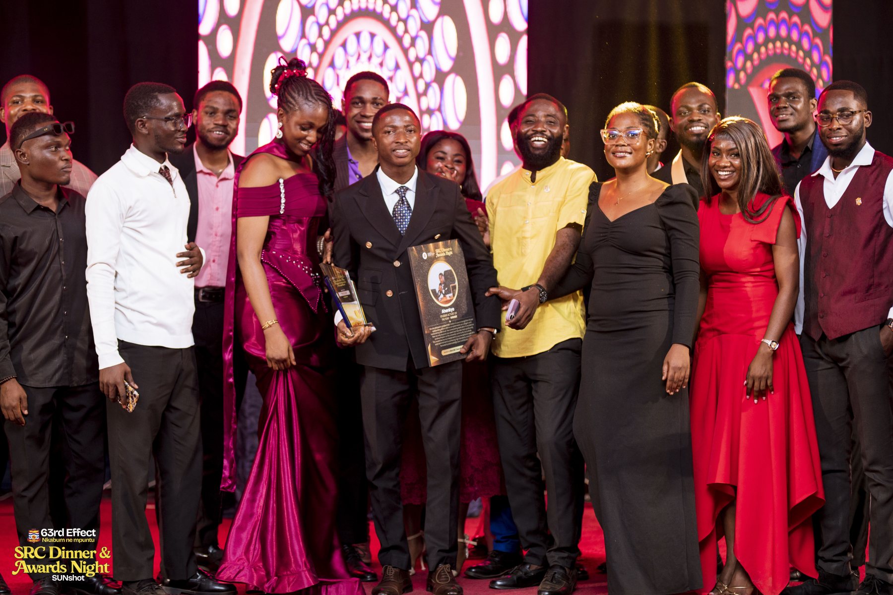 Award recipients and presenters on stage